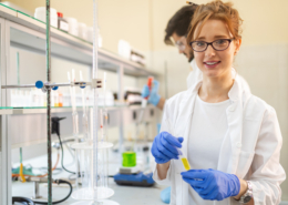 Young attractive female scientist researching in the laboratory